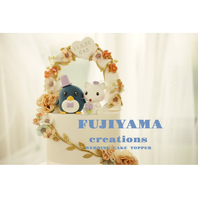 Penguin and white fox Wedding Cake Topper RM40383126